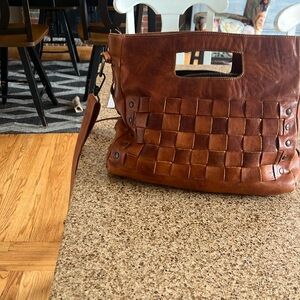 Gently used purse.  Has a zipper, crossbody